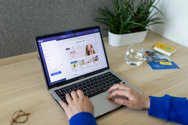 A person navigating an online store on a laptop, at a modern indoor office desk. Affiliate income checklist for the day it matters