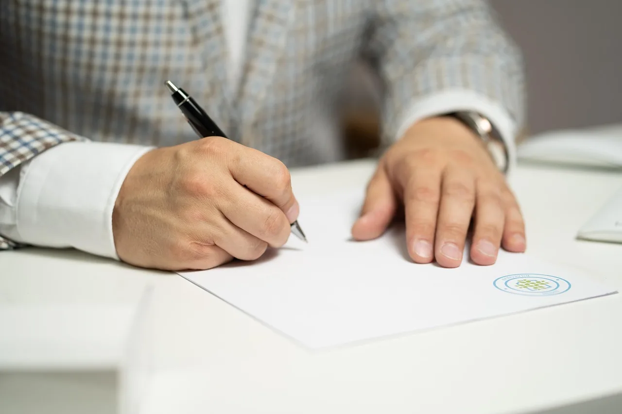 man, sign, paper, write, document, contract, signing, agreement, signature, signing document, signing contract, signing paper, sign, contract, contract, contract, contract, contract, signing, agreement, signature, signature. Brand deal income trends: what your own contract file can and cannot show