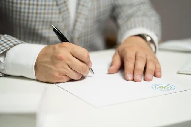 man, sign, paper, write, document, contract, signing, agreement, signature, signing document, signing contract, signing paper, sign, contract, contract, contract, contract, contract, signing, agreement, signature, signature. Brand deal income trends: what your own contract file can and cannot show