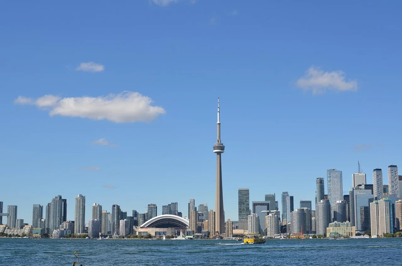toronto, canada, skyline, ontario, cityscape, toronto, toronto, toronto, toronto, toronto. Toronto compared with Vancouver on platform creator taxes and payouts