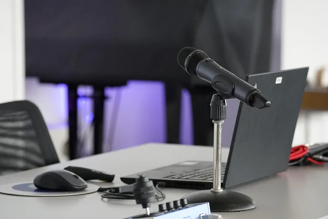 laptop, conference table, mouse, work, business, online, remote, microphone, podcast, podcast, podcast, podcast, podcast, podcast. Creator income economy: choosing Texas or Florida