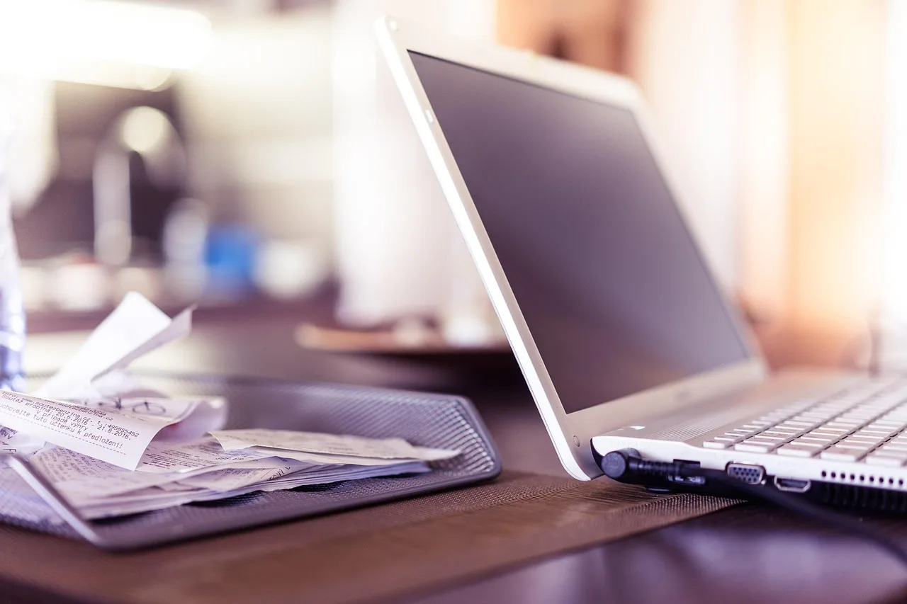 computer, desk, electronics, keyboard, laptop, papers, receipts, desk, receipts, receipts, receipts, receipts, receipts. Creator taxes framework: five record-keeping routines